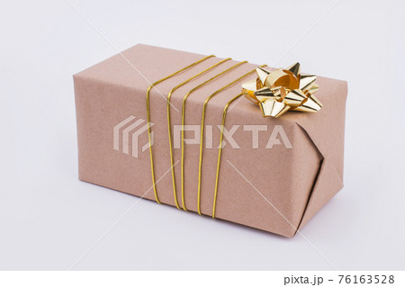 Brown paper gift box. Brown paper gift box. 76163528