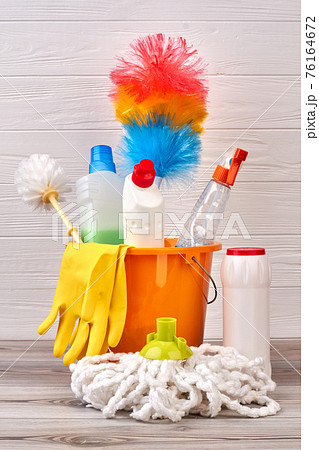 Variety of cleaning products in bucket. Variety of cleaning products in bucket. 76164672