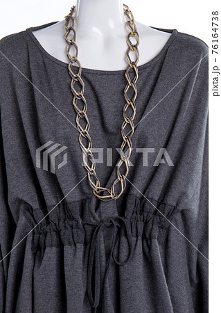 Mannequin with black cotton blouse and accessory. Mannequin with black cotton blouse and accessory. 76164738