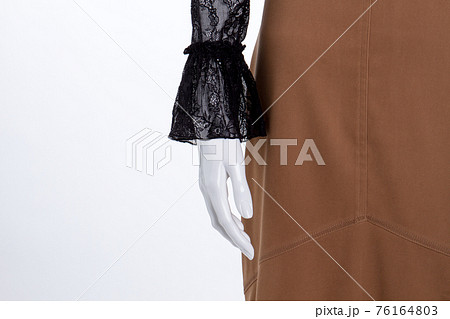 Close up mannequin hand and skirt. Close up mannequin hand and skirt. 76164803