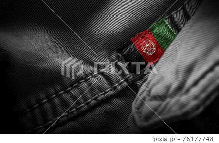 Tag on dark clothing in the form of the flag of the Afghanistan 76177748