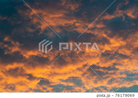 Beautiful sky landscape with yellow clouds at sunset 76179069