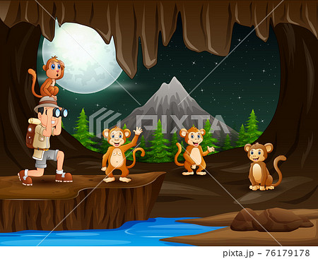 The explorer boy with four monkeys in the cave at night 76179178