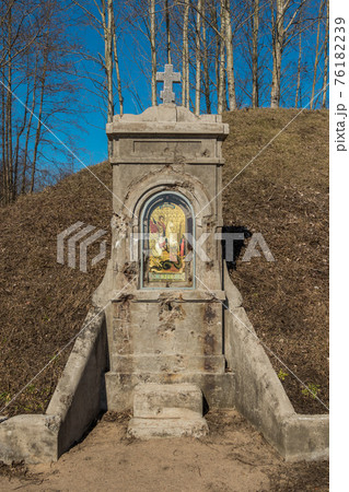 Russia. Kronstadt. April 3, 2019. A kiosk with an Icon of the Holy Great Martyr George the Victorious and a prayer, installed on the Kane battery, is now the Patriot Park Museum. 76182239