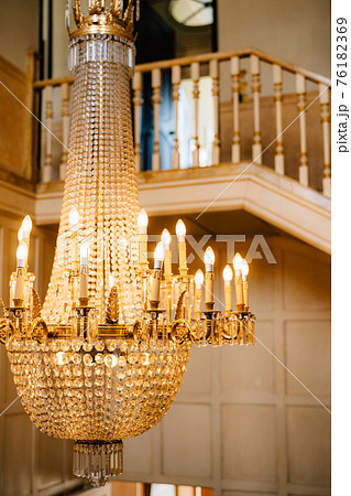 Antique large crystal chandelier with pendants and candles. Antique large crystal chandelier with pendants and candles. 76182369