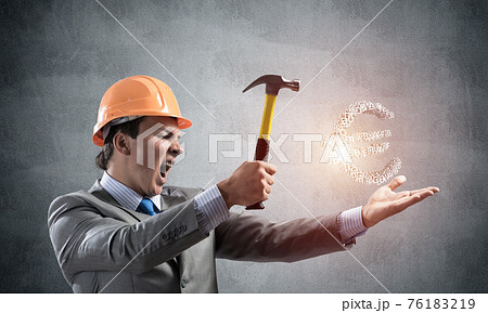 Businessman going to crash with hammer euro Businessman going to crash with hammer euro 76183219