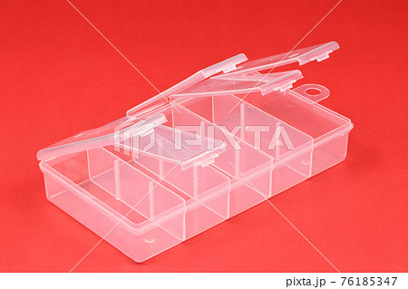Food plastic box isolated on red. Food plastic box isolated on red. 76185347