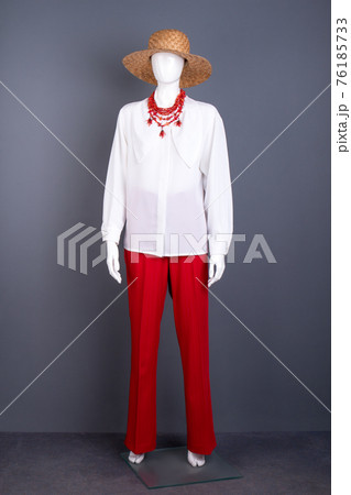 White elegant blouse and red necklace. White elegant blouse and red necklace. 76185733