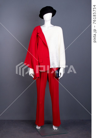 Mannequin in black hat and red suit. Mannequin in black hat and red suit. 76185754