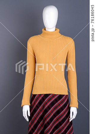 Woman winter apparel on mannequin. Woman winter apparel on mannequin. 76186045