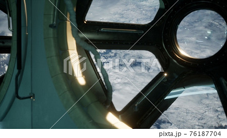 Cockpit view from International Space Station operating nearby of planet Earth Cockpit view from International Space Station operating nearby of planet Earth 76187704