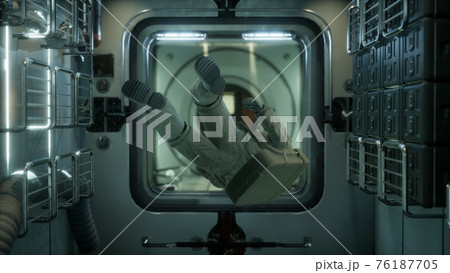 astronaut inside the orbital space station 76187705