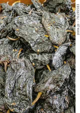 Black Chili in a pile ready for sale Black Chili in a pile ready for sale 76190583