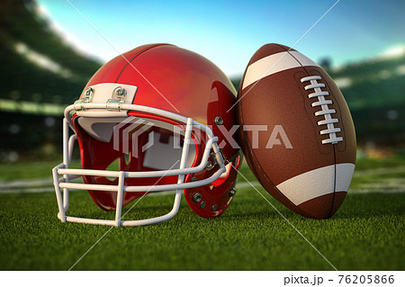American Football Ball And Helmet On The Grass のイラスト素材
