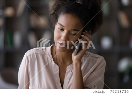 African American woman talk on smartphone gadget African American woman talk on smartphone gadget 76213736