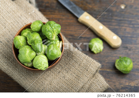 Brussels sprouts on rustic wooden table. 76214365