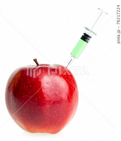 Apple with syringe 76217224