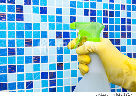 Spraying disinfectant on bathroom wall protective measures against coronavirus epidemy Spraying disinfectant on bathroom wall protective measures against coronavirus epidemy 76221817