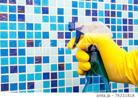 Spraying disinfectant on bathroom wall protective measures against coronavirus epidemy 76221818