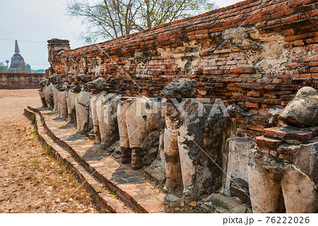 Elephant sculptures at ruins of buddhist temple in Ayutthaya, Thailand 76222026
