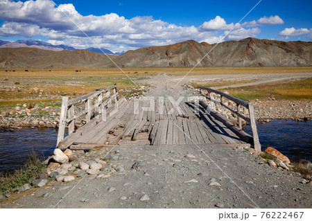 Worn down wooden bridge in Altai Mountains Mongolia 76222467