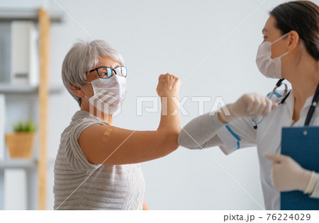 Senior woman after vaccination. 76224029