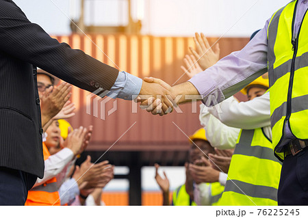 Engineers handshaking on construction site after successful meetingon workers or business Engineers handshaking on construction site after successful meetingon workers or business 76225245