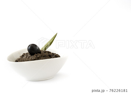 Black olive tapenade with anchovies, garlic and olive oil isolated Black olive tapenade with anchovies, garlic and olive oil isolated 76226181