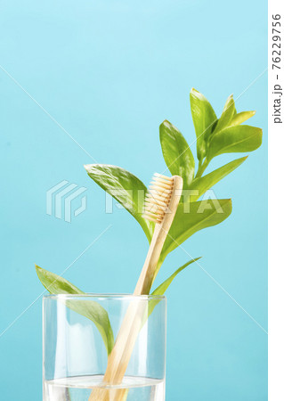 Eco-friendly bamboo toothbrush. Pastel background. Zero waste, life without plastic 76229756