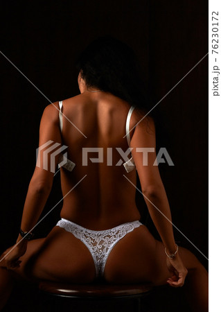 Art nude. Perfect body, sexy girl take off bra - Stock Photo
