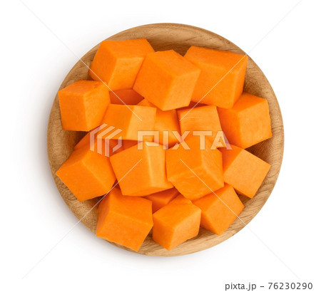 butternut squash slice in wooden bowl isolated on white background with clipping path and full depth of field. Top view. Flat lay 76230290