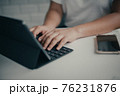 Female hands on keyboard ,Female freelance working business at home 76231876