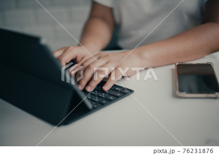 Female hands on keyboard ,Female freelance working business at home Female hands on keyboard ,Female freelance working business at home 76231876