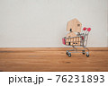 Home in Shopping cart , Buying and selling real estate, Home concept 76231893