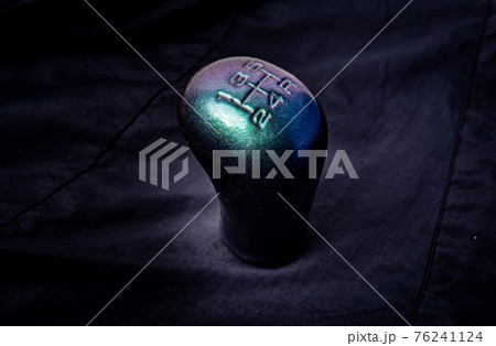 manual gearbox in the car macro black color effect gear Modified handle on wood floor manual gearbox in the car macro black color effect gear Modified handle on wood floor 76241124