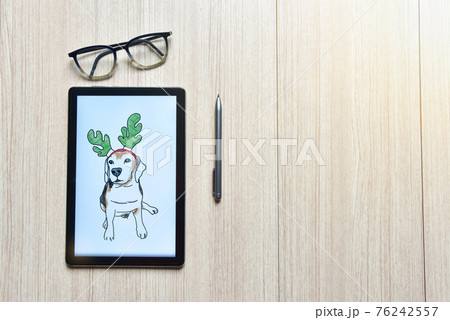 a tablet showing sketch the drawing of beagle dog wear a fake antler deer with digital pens and eyeglasses on wood table, the concept of new technology for drawing and rendering of tablet a tablet showing sketch the drawing of beagle dog wear a fake antler deer with digital pens and eyeglasses on wood table, the concept of new technology for drawing and rendering of tablet 76242557
