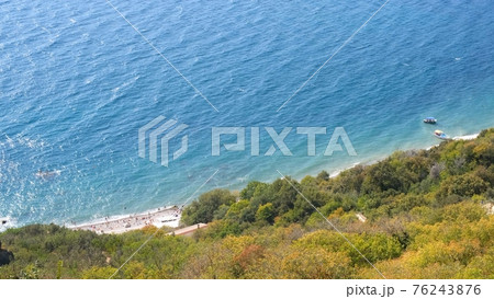 Beautiful view of the coast of the turquoise sea at Cape Fiolent, Crimea. The concept of tranquility Beautiful view of the coast of the turquoise sea at Cape Fiolent, Crimea. The concept of tranquility 76243876