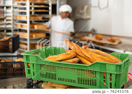 baguette in green and black box in kitchen 76245376