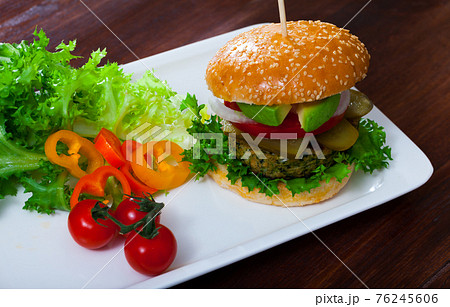 Vegan burger with greens Vegan burger with greens 76245606