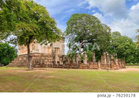 Famous big Buddha statue image named Phra Achana situated in ruined chapel at Wat Si Chum temple, Sukhothai Historical Park, Thailand 76250178