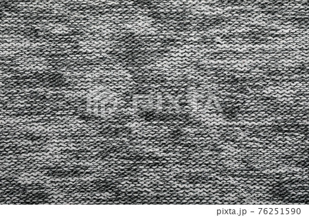 Heather grey knitted fabric textured background Heather grey knitted fabric textured background 76251590
