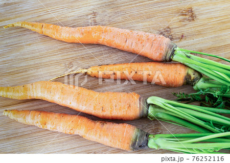 carrots fresh healthy root healthy snack on wooden background carrots fresh healthy root healthy snack on wooden background 76252116