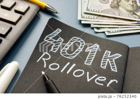 401k rollover memo on the notepad and cash. 401k rollover memo on the notepad and cash. 76252340