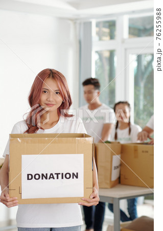 Woman at dontation center 76255988