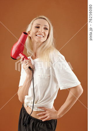 Hairdresser with blow dryer 76256080