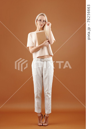 Smart woman with book 76256663