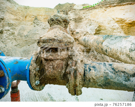 Pipes and a pipe for waterworks in digging in the road construct Pipes and a pipe for waterworks in digging in the road construct 76257186