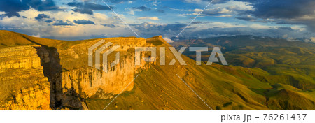 Plateau Bermamyt and hills at sunset 76261437