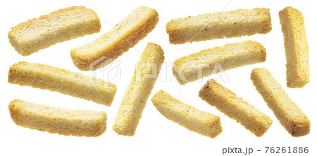 White bread croutons, salted bread sticks isolated on white background White bread croutons, salted bread sticks isolated on white background 76261886