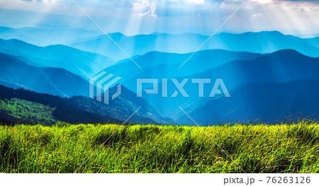 Morning fog in spring mountains 76263126